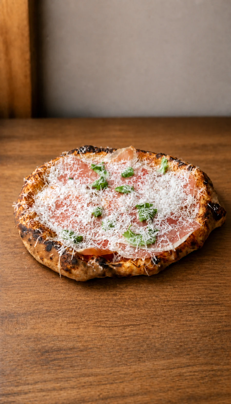 A finished pizza directly on my timber worktop